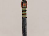 a small knife with a wooden handle on a white surface
