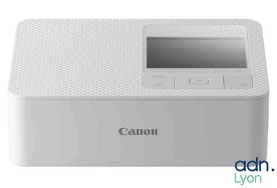 un gros plan d'une imprimante Canon posée sur une table