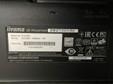 a close up of a laptop with a label on it