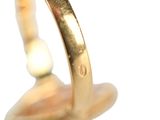 an image of a close up of a ring on a white surface