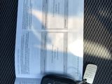a car key sitting on top of an open book