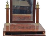 an image of a wooden vanity with a mirror on top of it