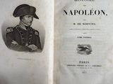 an old book with a picture of a man in uniform
