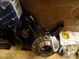 a picture of a close up of a wheel and some parts on a wooden table