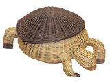 an image of a basket shaped like a turtle on a white background