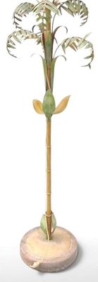 a palm tree that is on a wooden stand