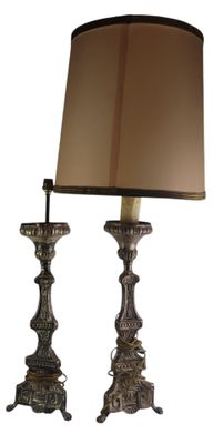 pair of antique brass table lamps with shades on each of them