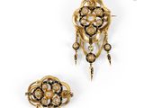 a pair of gold and diamond brooches