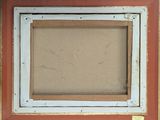 an old picture frame with a picture of a cat in it