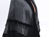 black leather cape with fringes on a mannequin mannequin mannequin mannequin mannequin mannequin mannequin mannequin