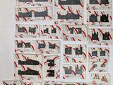 a picture of a bunch of postcards on the wall