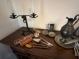 a table with a tea pot, tea kettle and other items on it