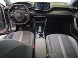 the interior of a car with a steering wheel, dashboard, and dashboard controls