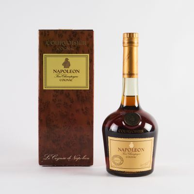 a bottle of wine next to a box on a white surface