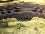 a close up of a purse with a zipper on it