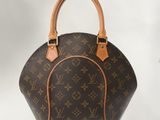 Sac à main Louis Vuitton Alma MM en toile Monogram