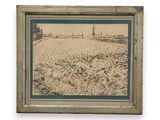 framed picture of a field of corn with a lone house in the distance