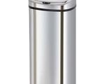 the stainless steel trash can is open and ready to use