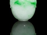 chinese jade snuffling bottle with green and orange decoration