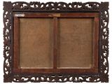 an old wooden picture frame with a picture of a man and a woman