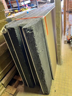 several pieces of concrete are stacked on top of each other in a room