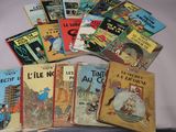 de nombreux livres pour enfants posés ensemble sur un lit