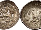 une pièce de monnaie en argent portant l'image d'un homme et d'une femme