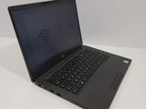 an image of a laptop with a wifi connection on the screen