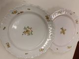 two plates that are sitting next to each other on a table