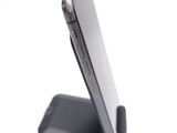 a close up of a cell phone on a stand