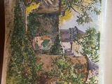 une image d'un livre avec une image de maison dessus