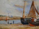 tableau représentant deux bateaux amarrés sur une plage de sable