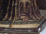 an image of a painting of a man with a crown on a table