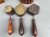 several different types of tools are sitting on a table