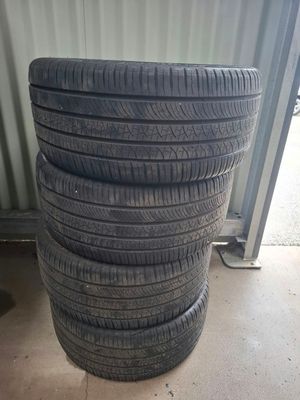 a stack of four tires stacked on top of each other