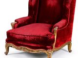 une image représentant une chaise rouge sur fond blanc