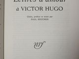 an open book with a black and white image of a man ' s face