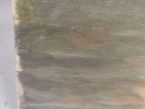 a close up of a painting on a white surface