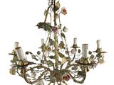 an image of a chandelier with flowers and leaves on it