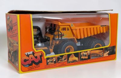 a box with a toy truck inside of it