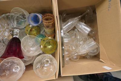 a box full of empty plastic cups and containers