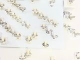 a lot of rings on a table with a lot of them