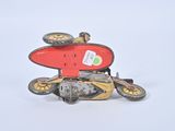 a toy motorcycle with a surfboard on top of it