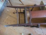 a chair that is sitting on the floor in the room