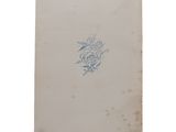 an old book with a drawing of a dragon on it