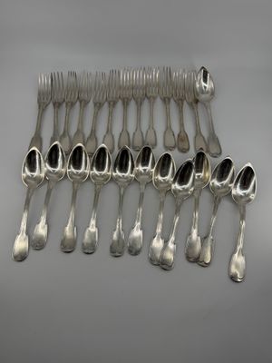 a lot of silver spoons and forks on the table