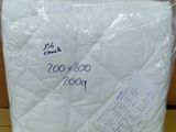 the mattress is wrapped in plastic and ready to be shipped