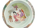 a plate with a picture of a woman and a child on it