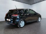 a picture of a black car parked in a showroom