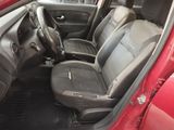 a red car with black seats in the back of it